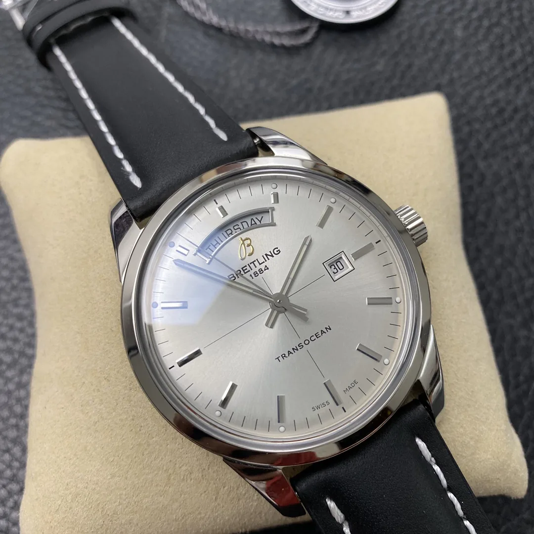 Luxury Swiss Replica Breitling Transocean Day & Date A4531012-G751BKCD – Elegant Silver Dial & Black Leather Strap
